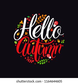 Hello, Autumn. Autumn round banner. Hand-drawn calligraphy on the background of autumn leaves, berries and mushrooms