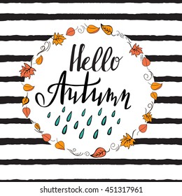 "Hello autumn" template with striped background, wreath of doodle style leaves and modern lettering