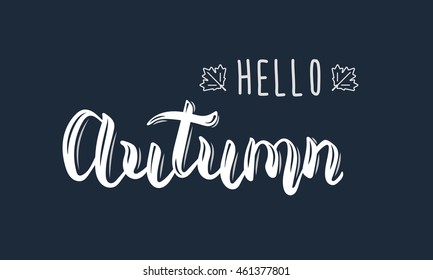 Hello Autumn. Trendy white hand lettering quote, fashion graphics, art print for posters and greeting cards design. Calligraphic isolated quote in black ink. Vector illustration