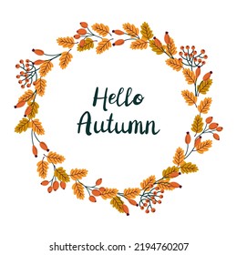 Hello Autumn. Vector fall wreath with leaves and berries. Fall floral elements and hand written lettering. Round frame made from hand drawn botanical elements. 