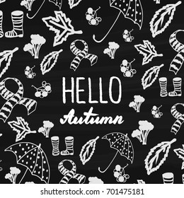 Hello Autumn. Vector illustration with hand drawn lettering and doodles on chalkboard background.