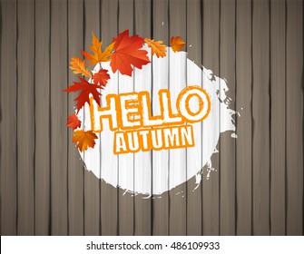 Hello Autumn Vector Lettering on Wooden Board. Autumn vector background.