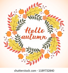 Hello Autumn written with brush. Calligraphy handwritten lettering. Wreath with colorful leaves, flowers and pumpkin. Easy to edit vector template for t-shorts, mugs, banners, cards, social media etc.