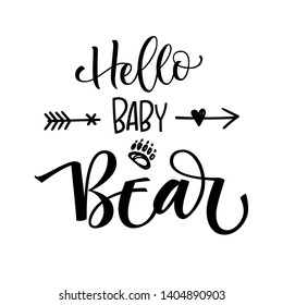 Hello Baby Bear phrase. Hand drawn calligraphy and grotesque style baby shower lettering quote. Simple isolated text with bear foot print, boho arrows decor. Print, invitation, card, poster design 