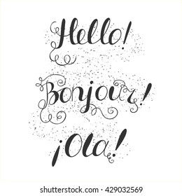 Hello, Bonjour, Ola hand written lettering on abstract grunge background