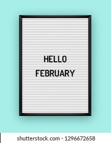 Hello February motivation quote on white letterboard with black plastic letters