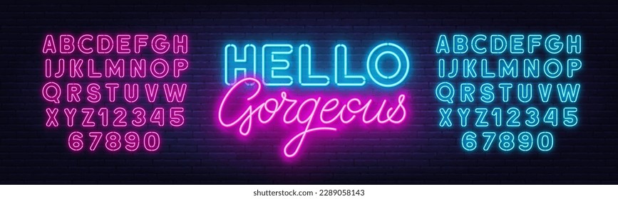 Hello Gorgeous neon quote on brick wall background.