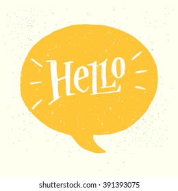 'Hello' hand lettering. Fun doodle style calligraphic headline in yellow speech bubble.