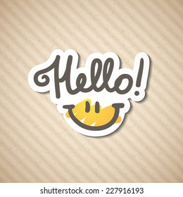 hello, handwritten text and smile on rough cardboard texture