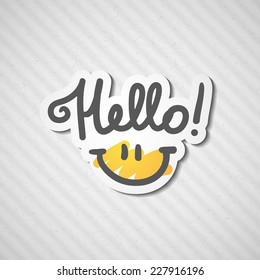 hello, handwritten text and smile on rough cardboard texture