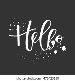 Hello lettering hand written inscription with ink splashes on black background