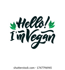 Hello i m Vegan With green leaves. Hand calligraphy lettering. Organic food tag, icon. As template of logo of cafe, restaurants, products packaging. Vector illustration. Vegetarian lifestyle concept.