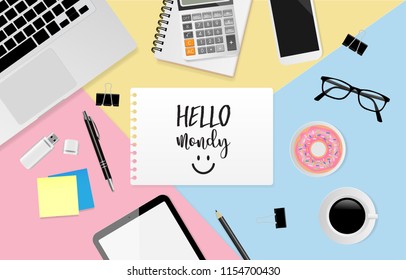 Hello Monday text on white sheet with pen, black paper clips, calculator, coffee cup, donut, USB Flash Drive, eyeglasses, tablet and smartphone on pastel color background. Flat lay