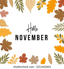 hello november text with autumn leaves background