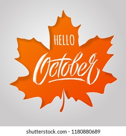 Hello October lettering with maple leaf on light background. Paper cut style. Modern brush calligraphy. Autumn banner. Vector typography for social media banner, greeting card, poster, flyer. EPS10