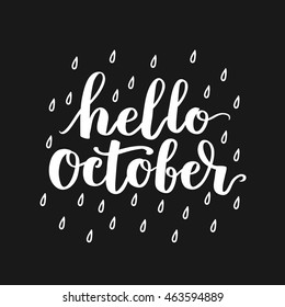 Hello, October. The trend calligraphy. Beautiful handwritten quote with rain drops. Vector illustration on dark background.