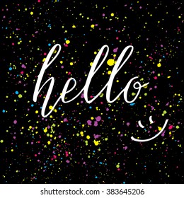 Hello phrase with smile on black background with bright color stains.