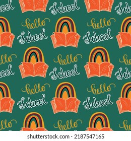 Hello school seamless pattern with book and lettering phrase. Chalkboard style