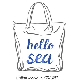 Hello sea. Brush hand lettering on a sample tote bag. Great for beach tote bags, swimwear, holiday clothes, posters, and more.