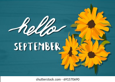 Hello September. Hand drawn lettering on textured background with flower illustration