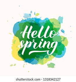 Hello spring calligraphy hand lettering on colorful watercolor stains. Inspirational seasonal quote typography poster. Vector illustration. Easy to edit template for banner, flyer, badge.