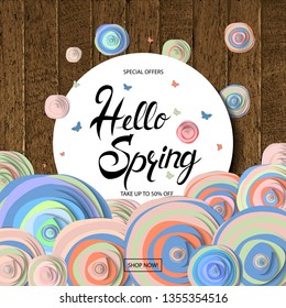 Hello Spring card design with a wooden background and text in round frame, vector illustration. Lettering design element