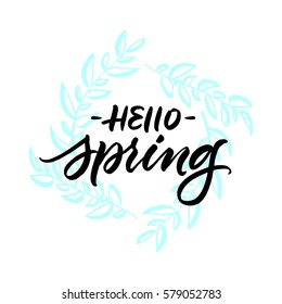 Hello spring greeting card with handwritten brush calligraphy on hand drawn leaves wreath