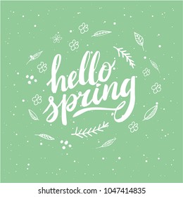Hello Spring. Hand drawn calligraphy and brush pen lettering. design for holiday greeting and seasonal spring holiday card. Green pastel background