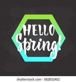 Hello, spring - hand drawn lettering phrase isolated on the black chalkboard background. Fun brush ink inscription for photo overlays, greeting card or t-shirt print, poster design