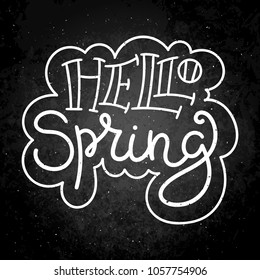 Hello spring. Hand drawn modern image with hand-lettering and decoration elements on blackboard. Inspirational quote. Illustration for prints on t-shirts and bags, posters, cards.