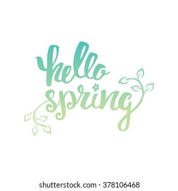 Hello Spring. Hand lettering, calligraphy inscription with spring leaves.
