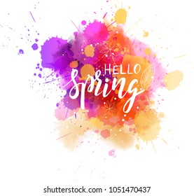 Hello Spring hand lettering phrase on watercolor imitation color splash. Modern calligraphy inspirational quote. Vector illustration.