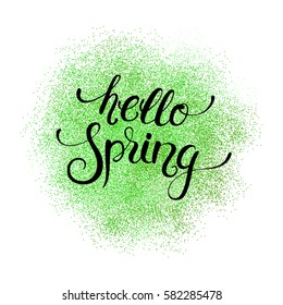 Hello spring handwritten calligraphy lettering on green glitter splash. Vector illustration.