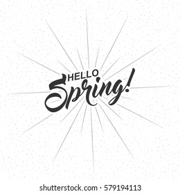 Hello Spring inscription with rays of blast isolated on white background. Calligraphy font style. Vector illustration.