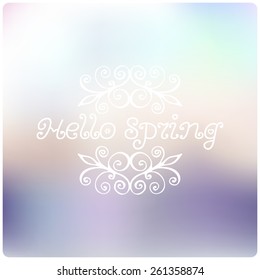 Hello Spring lettering. Blurry background. Vector illustration