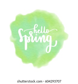 Hello spring lettering on fresh green water color paint on white background for greeting card, banner, poster template in vector illustration.