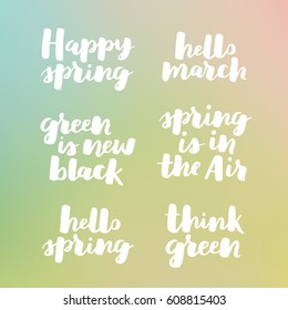 Hello spring lettering typography set. Calligraphy postcard or poster graphic design element. Hand written style card. Simple vector brush sign. White ink on green dreamy gradient.
