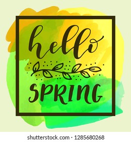Hello Spring modern calligraphy greeting card on yellow and green watercolor background in vector