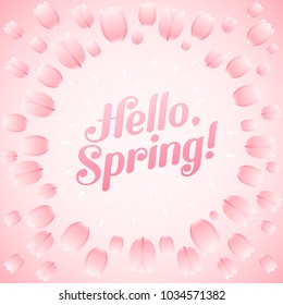 Hello, Spring! Romantic card with a calligraphic text in the frame of a tulips. Abstract splash of pink flowers. Glossy blossoms are like a spattering drops. Handwritten script about a coming Spring.