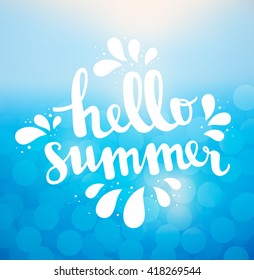 Hello summer card. Calligraphy lettering. overlay frame an ocean or sea blurred background with bokeh lights
