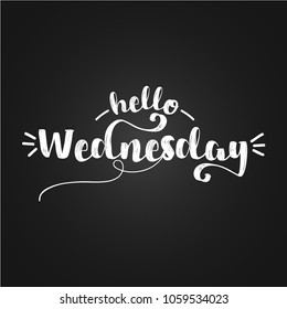 Hello Wednesday - inspirational lettering design for posters, flyers, t-shirts, cards, invitations, stickers, banners. Hand painted brush pen modern calligraphy isolated on a black chalkboard.
