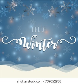 Hello winter banner with calligraphy brush on blue winter background with snow, snowflakes and little bokeh lights in blue and pink. Vector card design with typography.