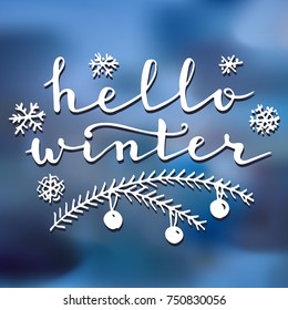 Hello winter brush hand lettering quote and decoration on blue square abstract background
