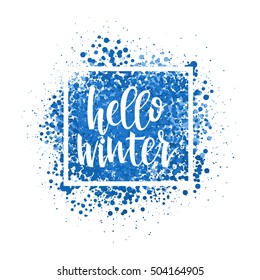 Hello winter concept. Handwritten brush lettering. Calligraphic text in a frame on blue abstract background. Vector greeting card. EPS 10.