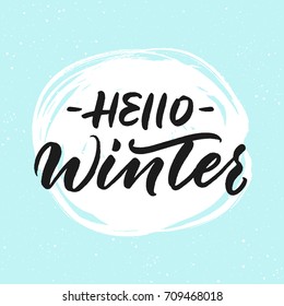 Hello winter greeting card. Handwritten inscription on snow background