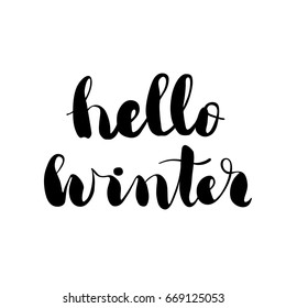 Hello winter - hand drawn black brush pen lettering isolated on white background, photo overlay, vector design element.