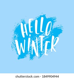 Hello winter. Handwritten lettering on a blue background. Lettering. Calligraphy. Vector.