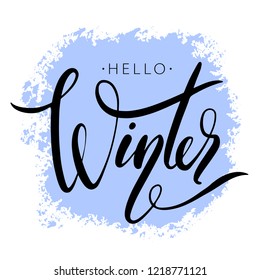 Hello winter phrase by hand on colorful background stroke. Hand drawn creative calligraphy and brush pen lettering, design for holiday greeting cards, banners and invitations.