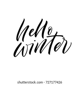Hello winter phrase. Greeting card. Ink illustration. Modern brush calligraphy. Isolated on white background.