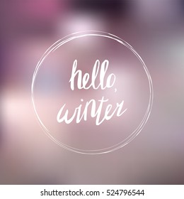 Hello, winter poster on blurred background with brush frame. Hand drawn. Lettering in vector